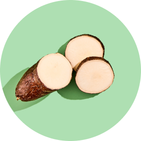 Sliced yam on a green background.